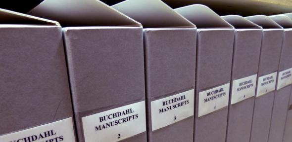 Row of archival boxes labelled "Buchdahl manuscripts"